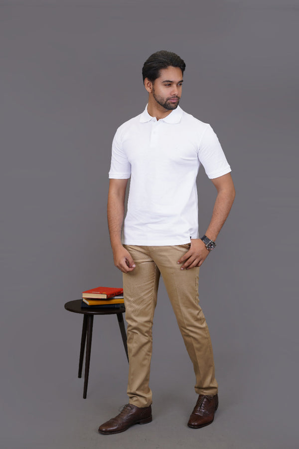 Side view of white polo shirt showing tailored fit